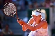 Elina Svitolina strikes the ball at the 2023 French Open